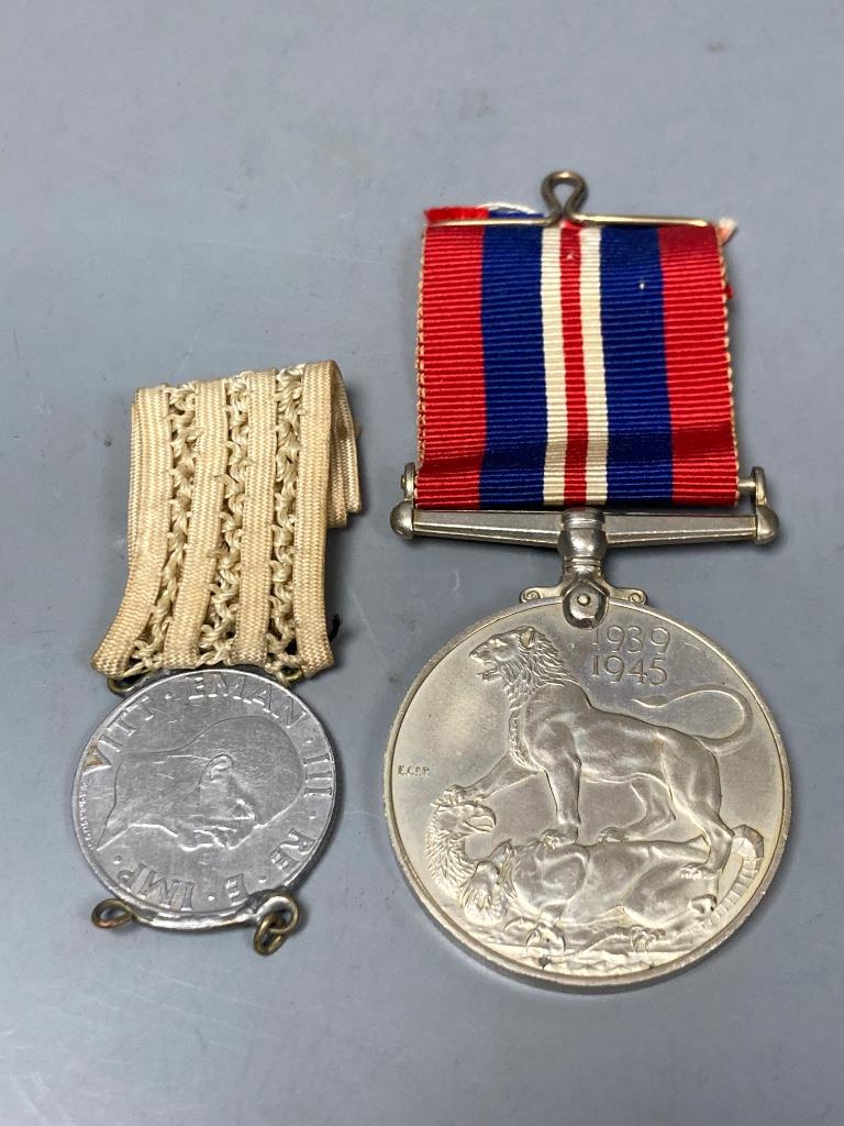 A WWI trio of medals to 304941. R. Brooks, STO. 1. R.N. and an unrelated WW2 medal